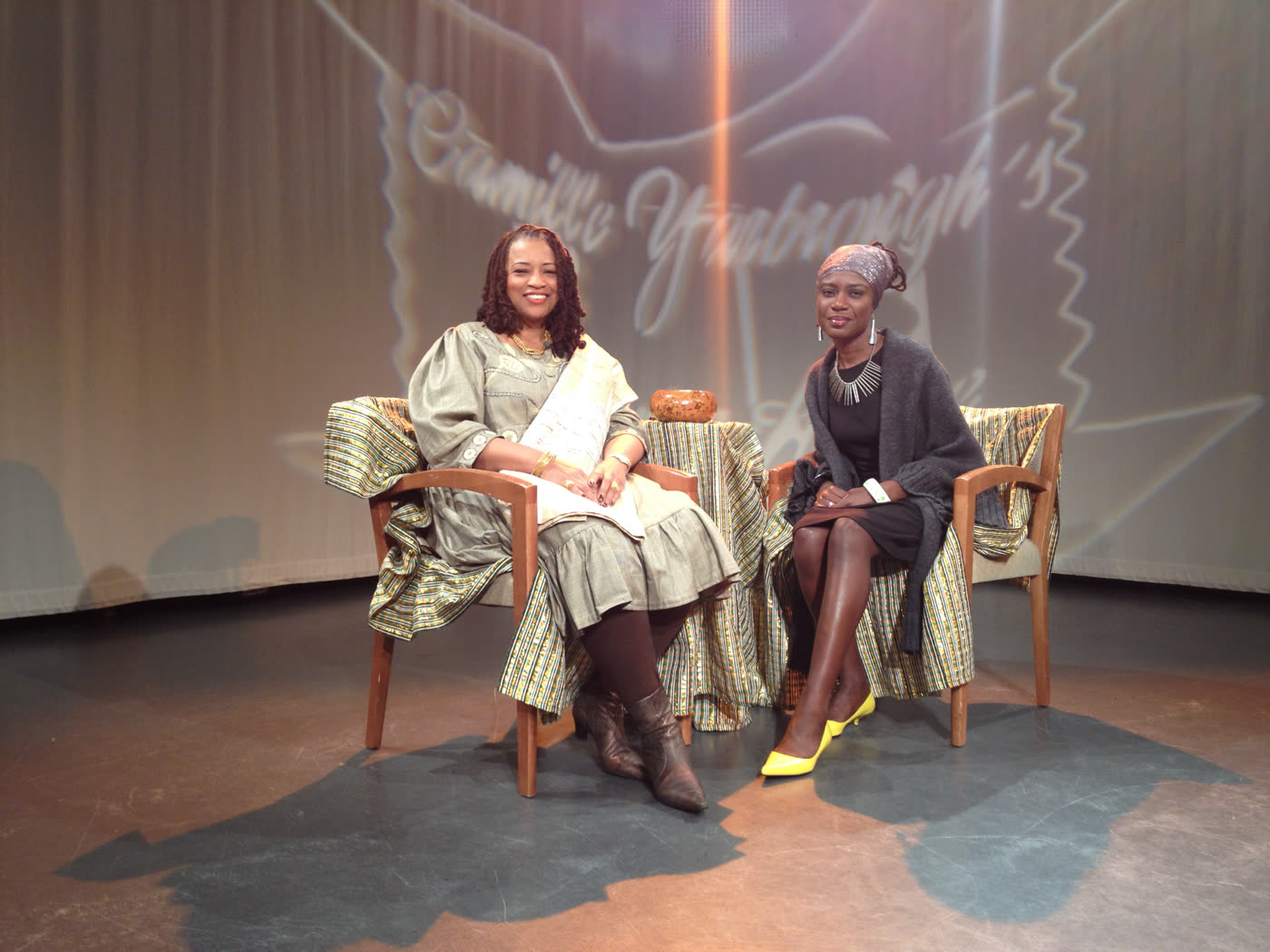 Dami Rock in conversation on the set of Camille Yarbrough's Ancestor House